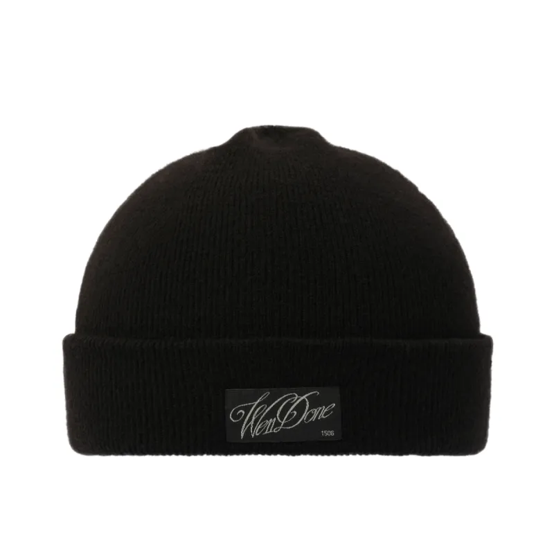 Patched Knit Beanie in Black sold by MARAIS