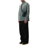 New Vertical Crossbody Pocket in Black sold by MARAIS