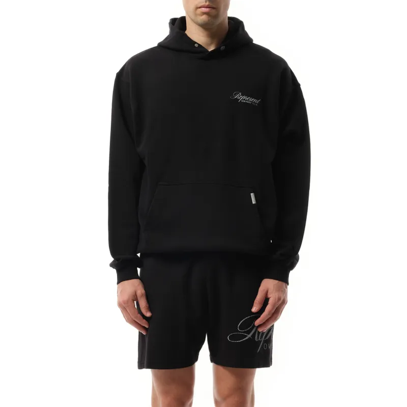 Represent Owners Club Script Hoodie in Black sold by MARAIS