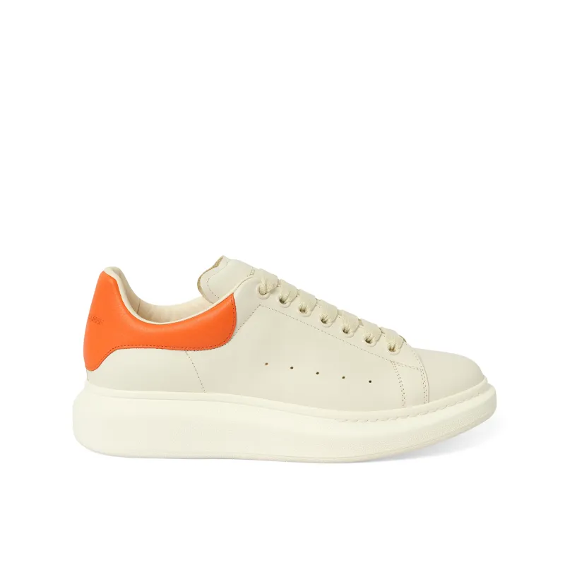 Larry Oversized Sneaker in Off White/Orange made by Alexander McQueen