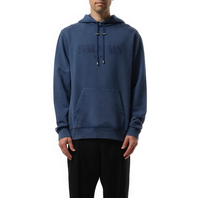 Balmain Vintage Emb Hoodie in Blue sold by MARAIS