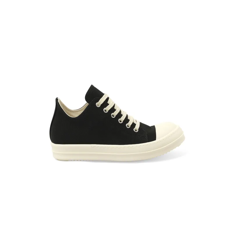 Canvas Low Sneaks in Black/Milk sold by MARAIS