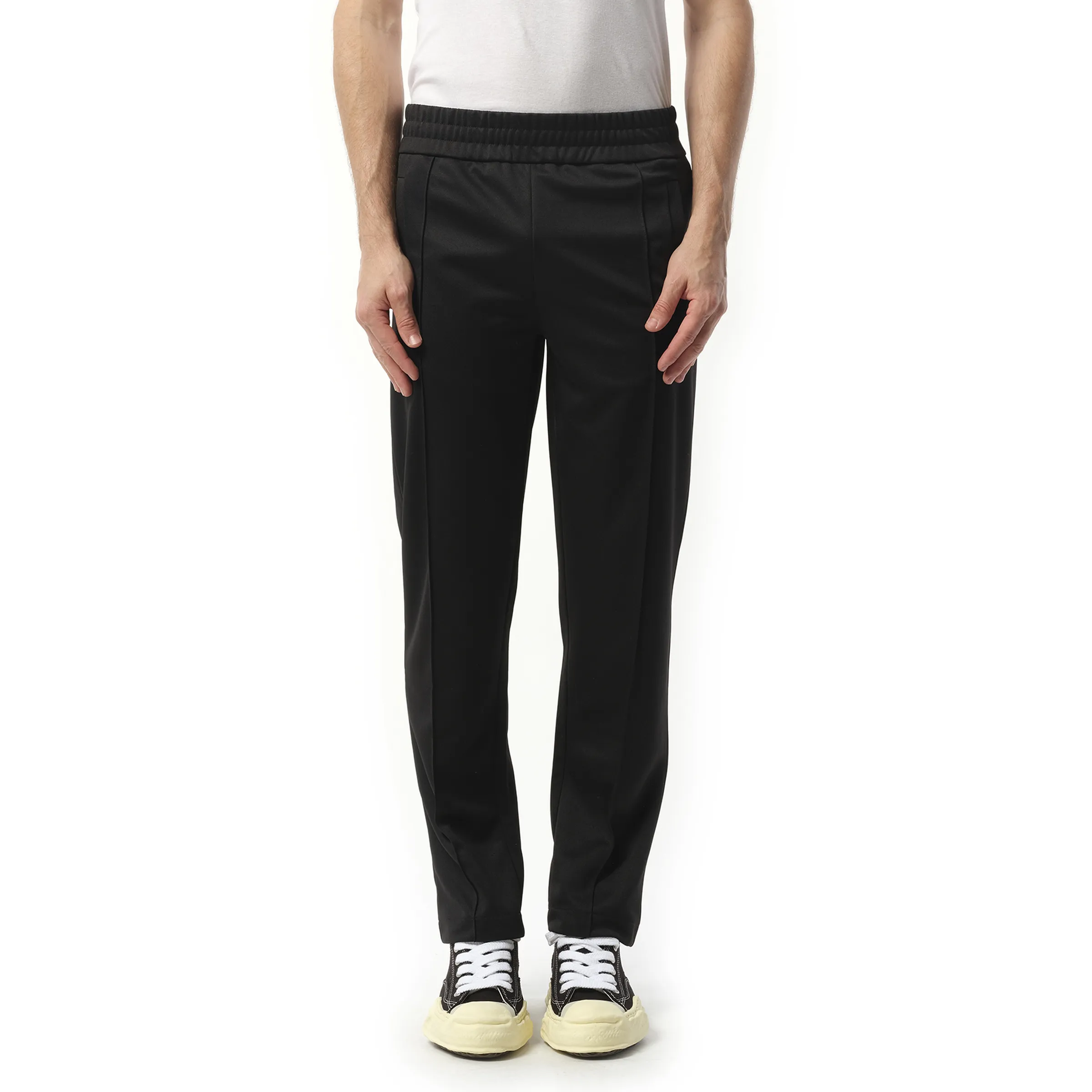 Back Curved Logo Track Pants in Black/Off White sold by MARAIS