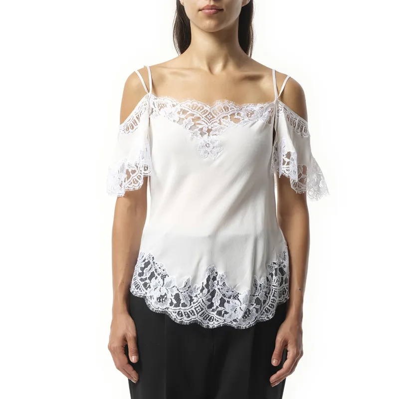 GIV - Sleeveless Top in White sold by MARAIS