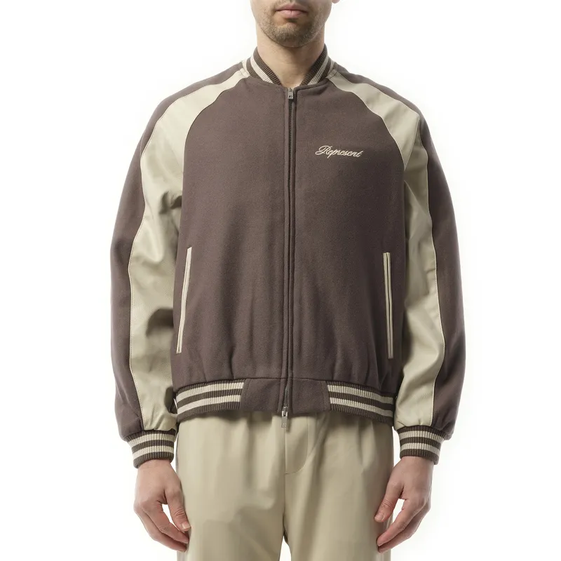 Raglan Varsity Jacket in Stone sold by MARAIS