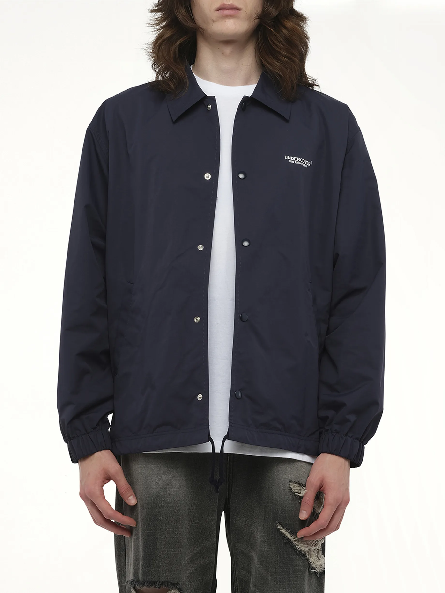 Undercover Coach Jacket in Navy sold by MARAIS