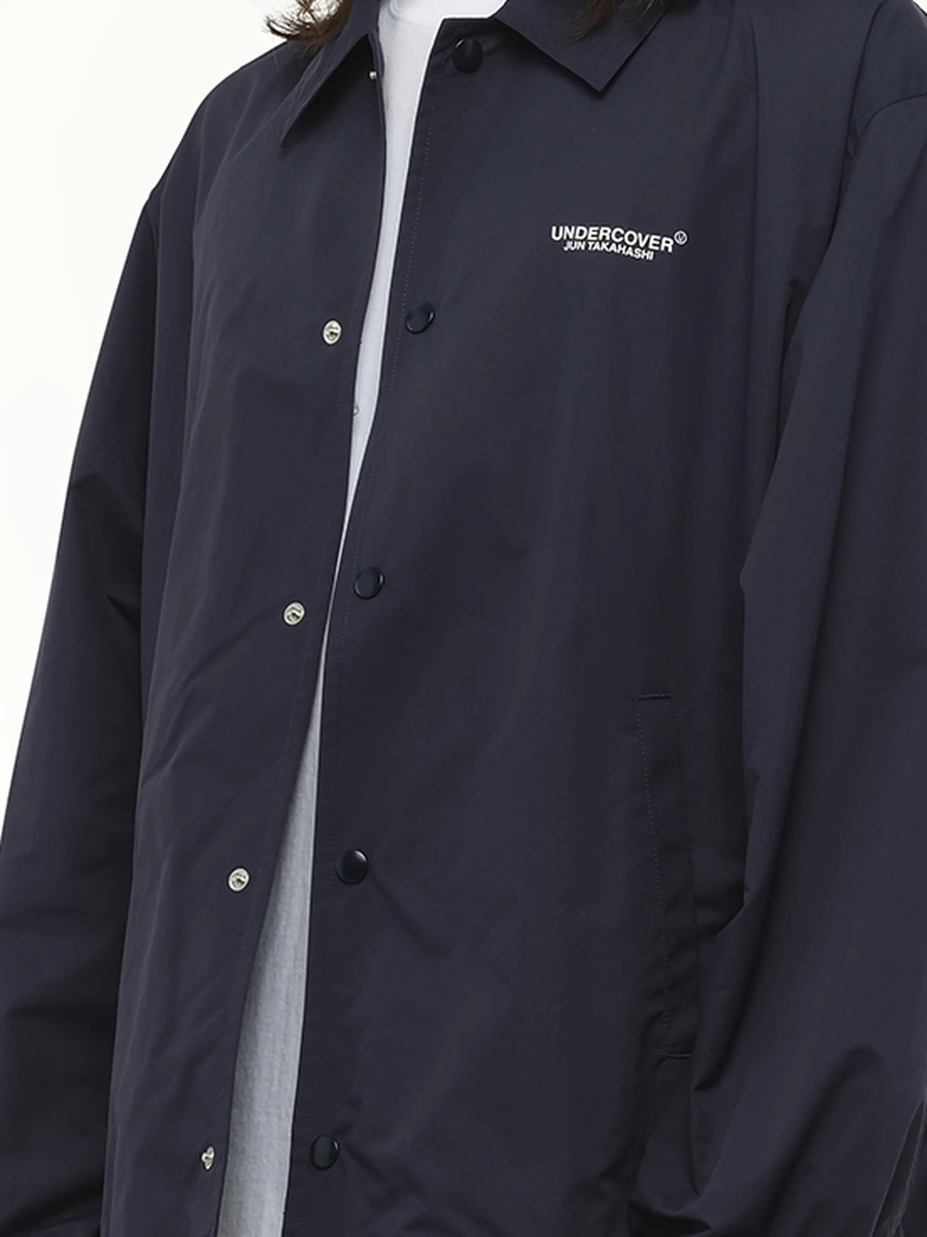 Undercover Coach Jacket in Navy sold by MARAIS product image thumbnail 3