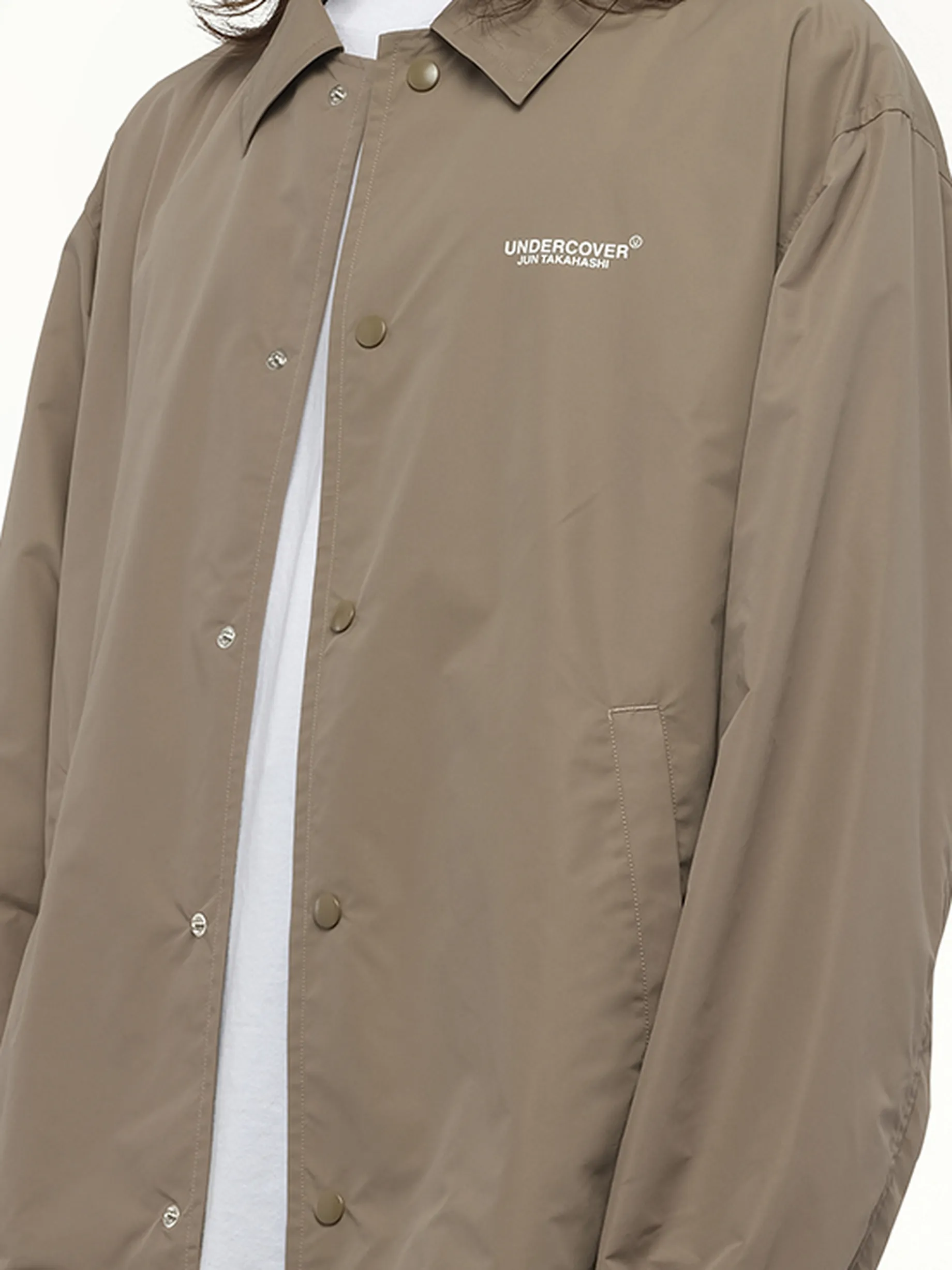 Undercover Coach Jacket in Beige sold by MARAIS product image thumbnail 3