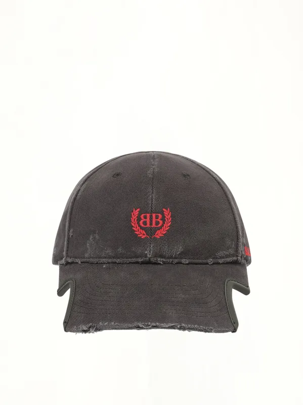 World Cap in Faded Wash Black/Red sold by MARAIS