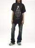Eye-Test Oversized T-Shirt in Washed Black/White sold by MARAIS