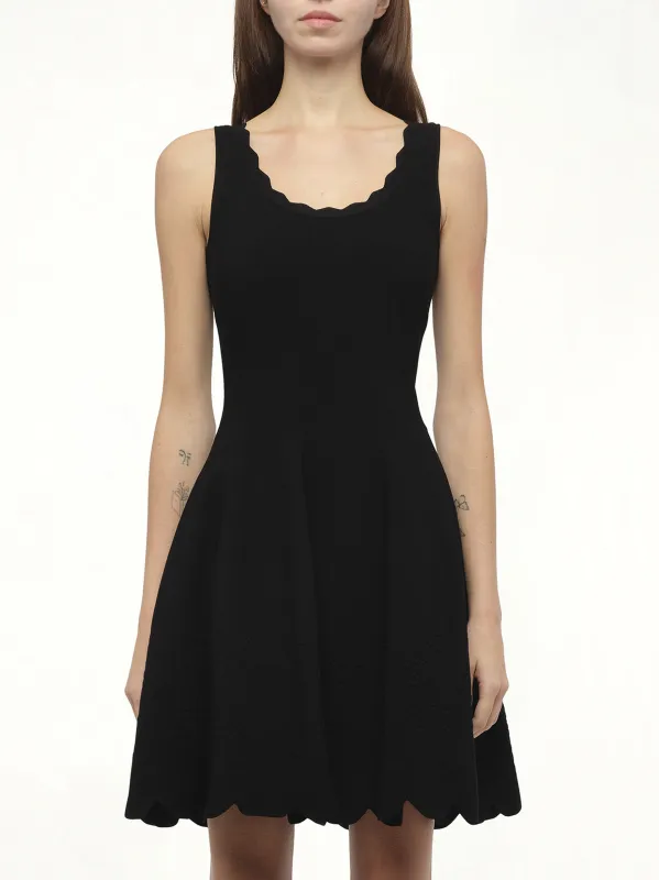 Emb Rose Mini Dress in Black sold by MARAIS