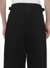 Pleated Carrot Pants in Black sold by MARAIS