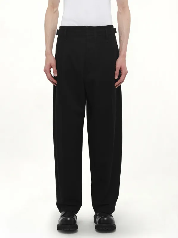 Pleated Carrot Pants in Black sold by MARAIS