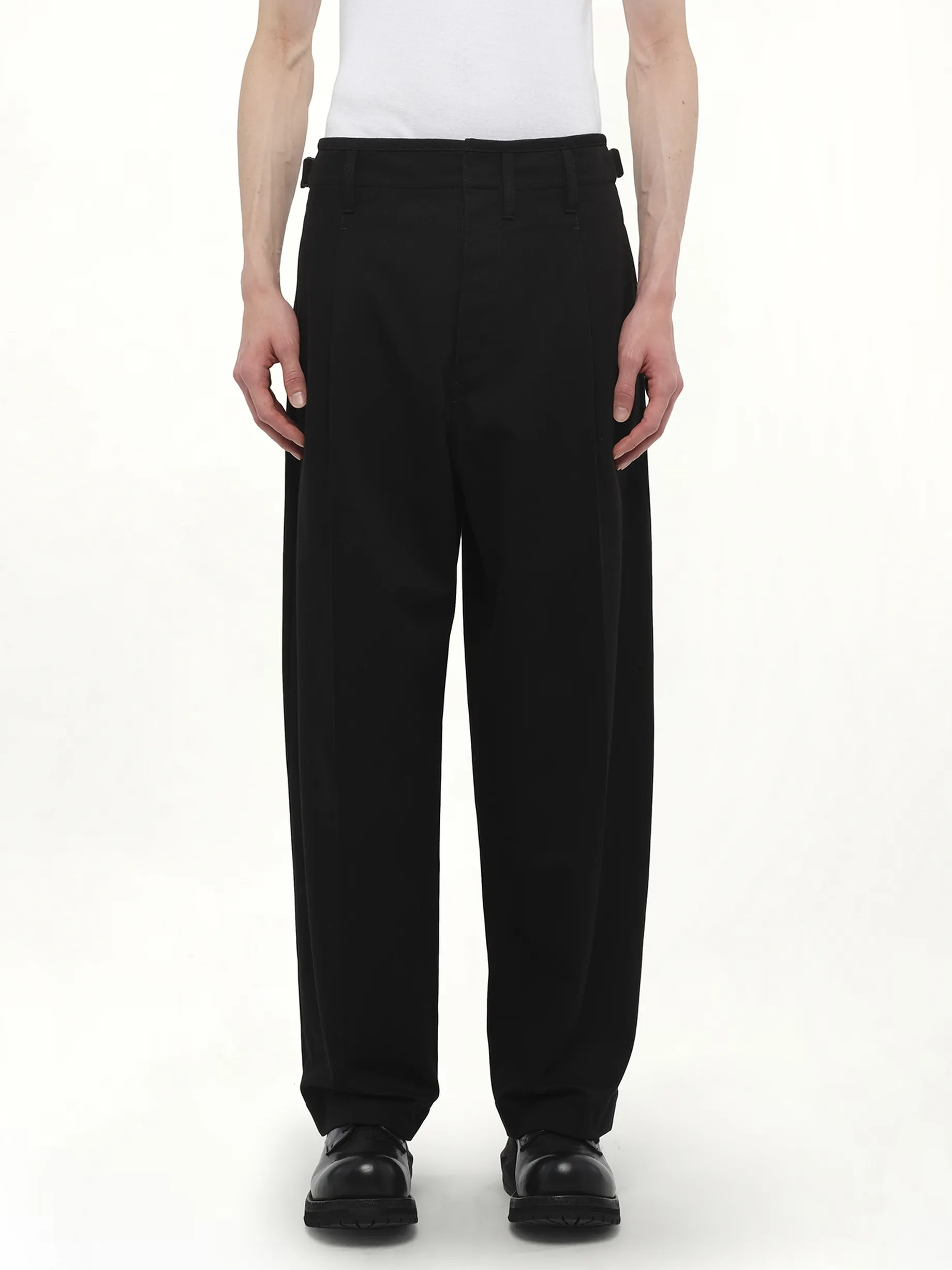 Pleated Carrot Pants in Black sold by MARAIS