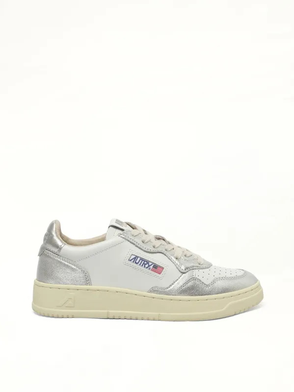 Medalist Low Bicolour Sneakers in White/Silver sold by MARAIS