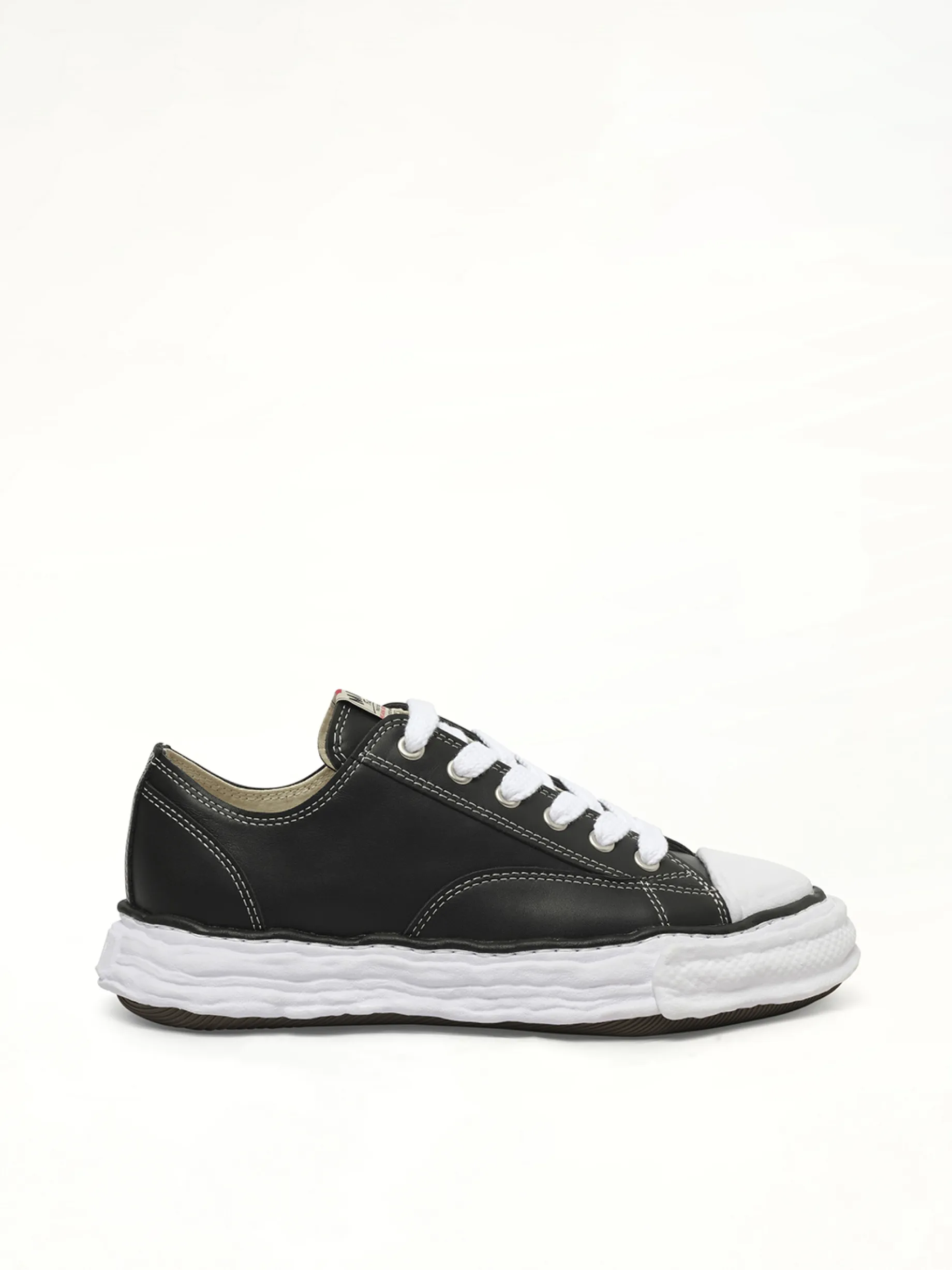 Peterson 23 OG Low Leather Sneaker in Black/White sold by MARAIS