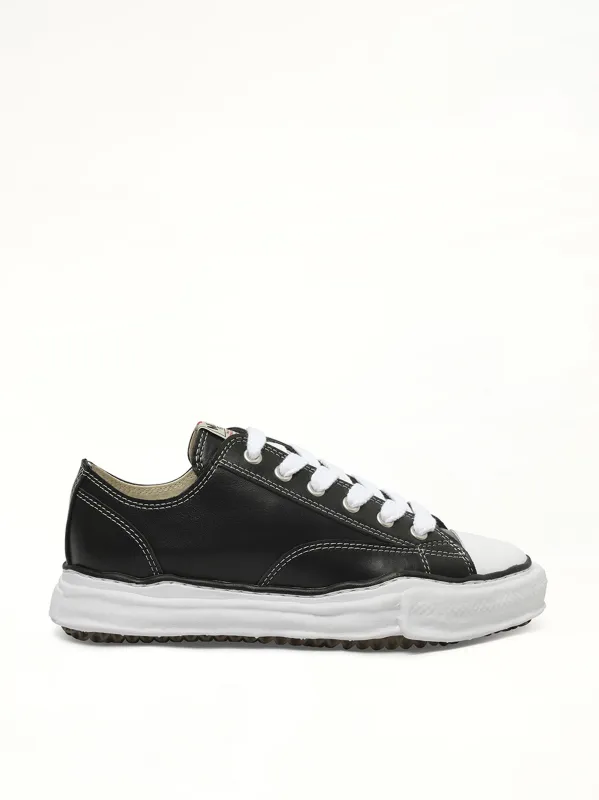 Peterson OG Leather Low Sneaker in Black/White sold by MARAIS