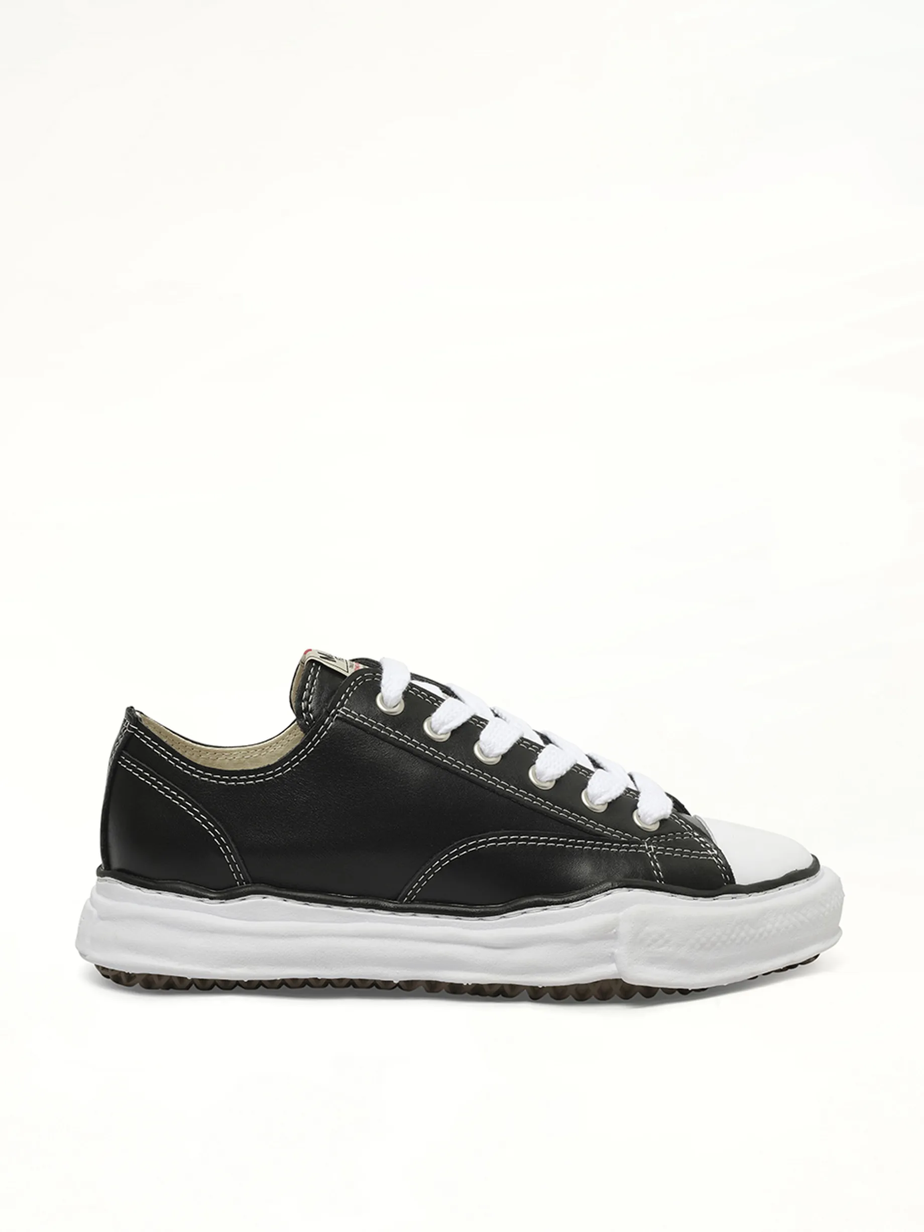 Peterson OG Leather Low Sneaker in Black/White sold by MARAIS