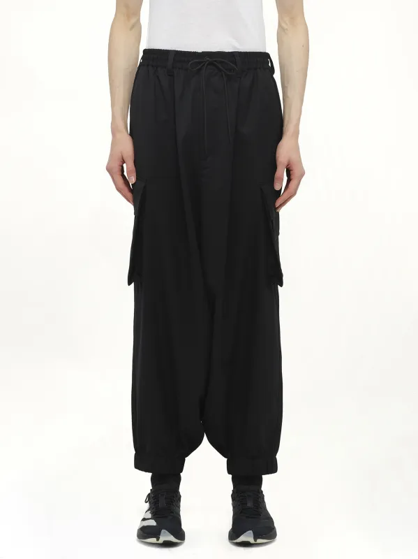 Refined Wool Cargo Pants in Black sold by MARAIS