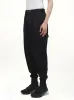 Rayon Twill Cuffed Pants in Black sold by MARAIS