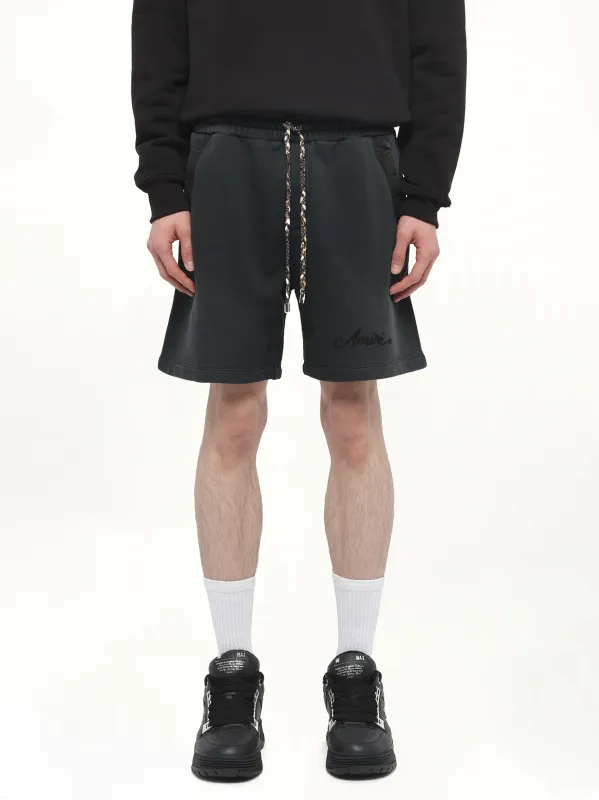 Bleach Bandana Shorts in Black made by AMIRI