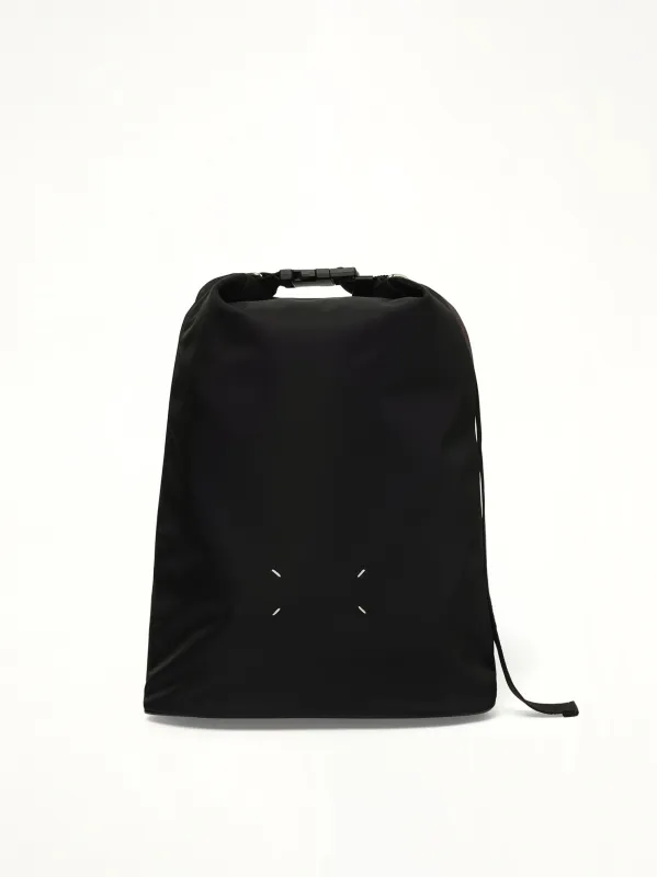 High Tech Roll Up Backpack in Black made by Maison Margiela