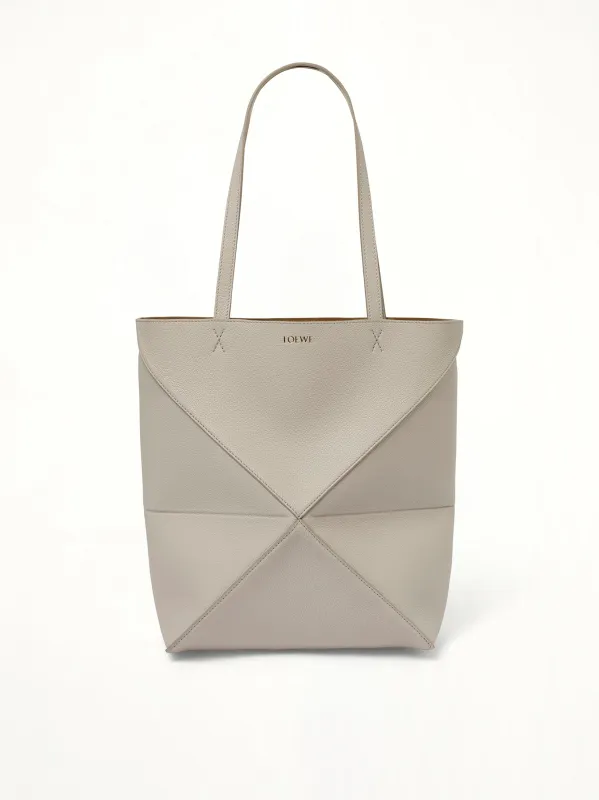 Puzzle Fold Tote Medium in Light Ghost sold by MARAIS