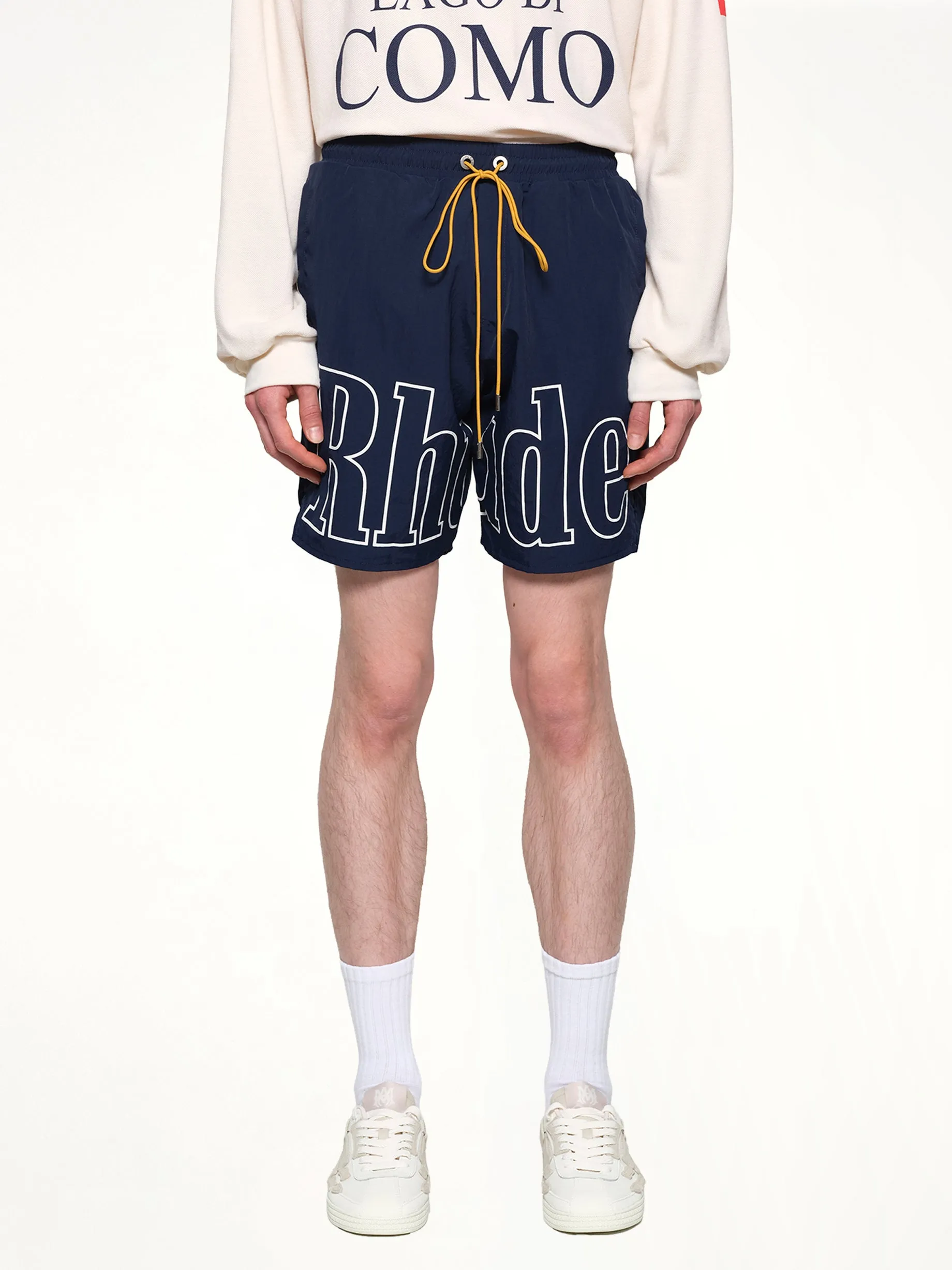 Rhude Logo Shorts in Navy sold by MARAIS