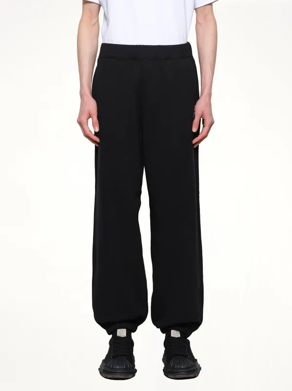 Floral Embroidered Sweatpant in Black sold by MARAIS