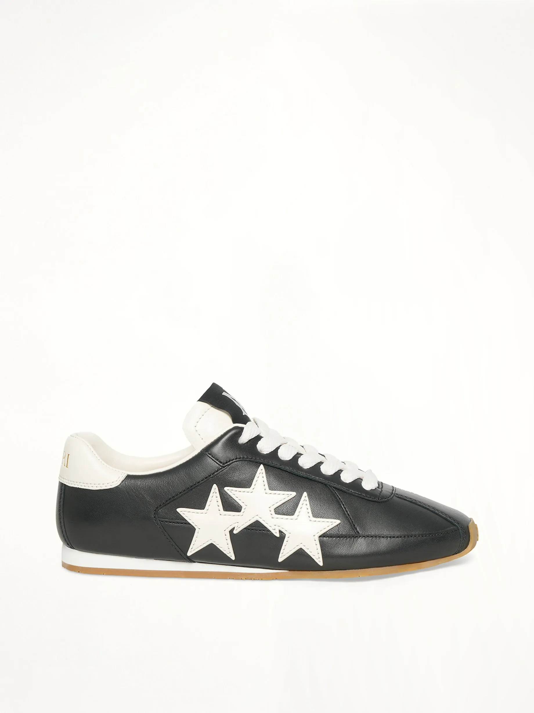 Pacific Slim Sneaker in Black sold by MARAIS