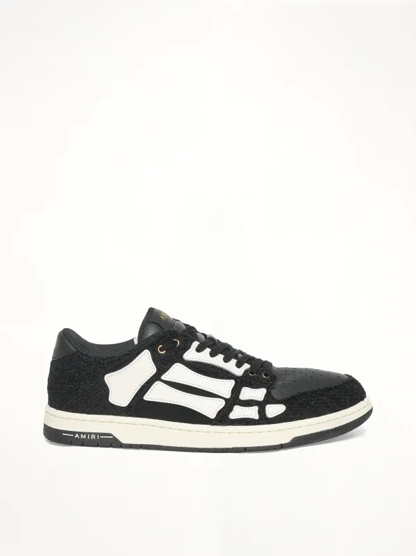 Boucle Skeleton Low Top Sneaker in Black sold by MARAIS