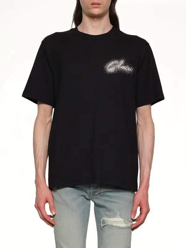 Amiri Script Tee in Black sold by MARAIS