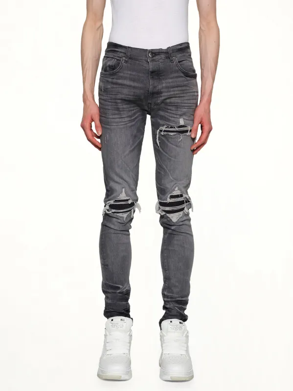 Suede MX1 Jeans in Storm Grey made by AMIRI
