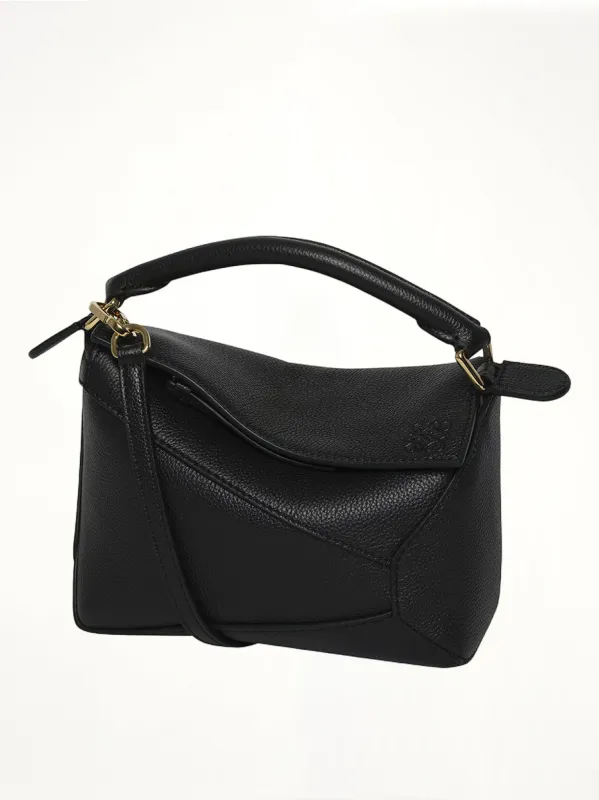 Puzzle Edge Mini Bag in Black sold by MARAIS