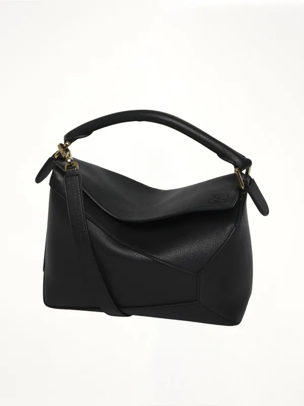Puzzle Edge Small Bag in Black sold by MARAIS