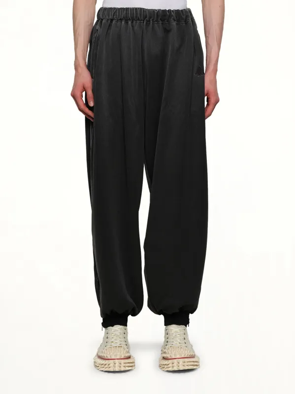 Faded Black Track Pants in Grey sold by MARAIS