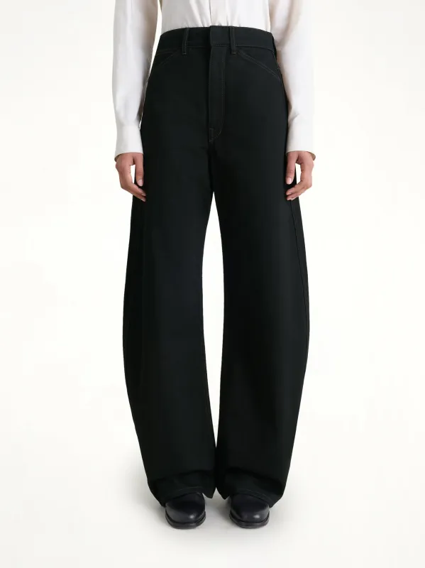 High Waisted Curved Pants in Black sold by MARAIS