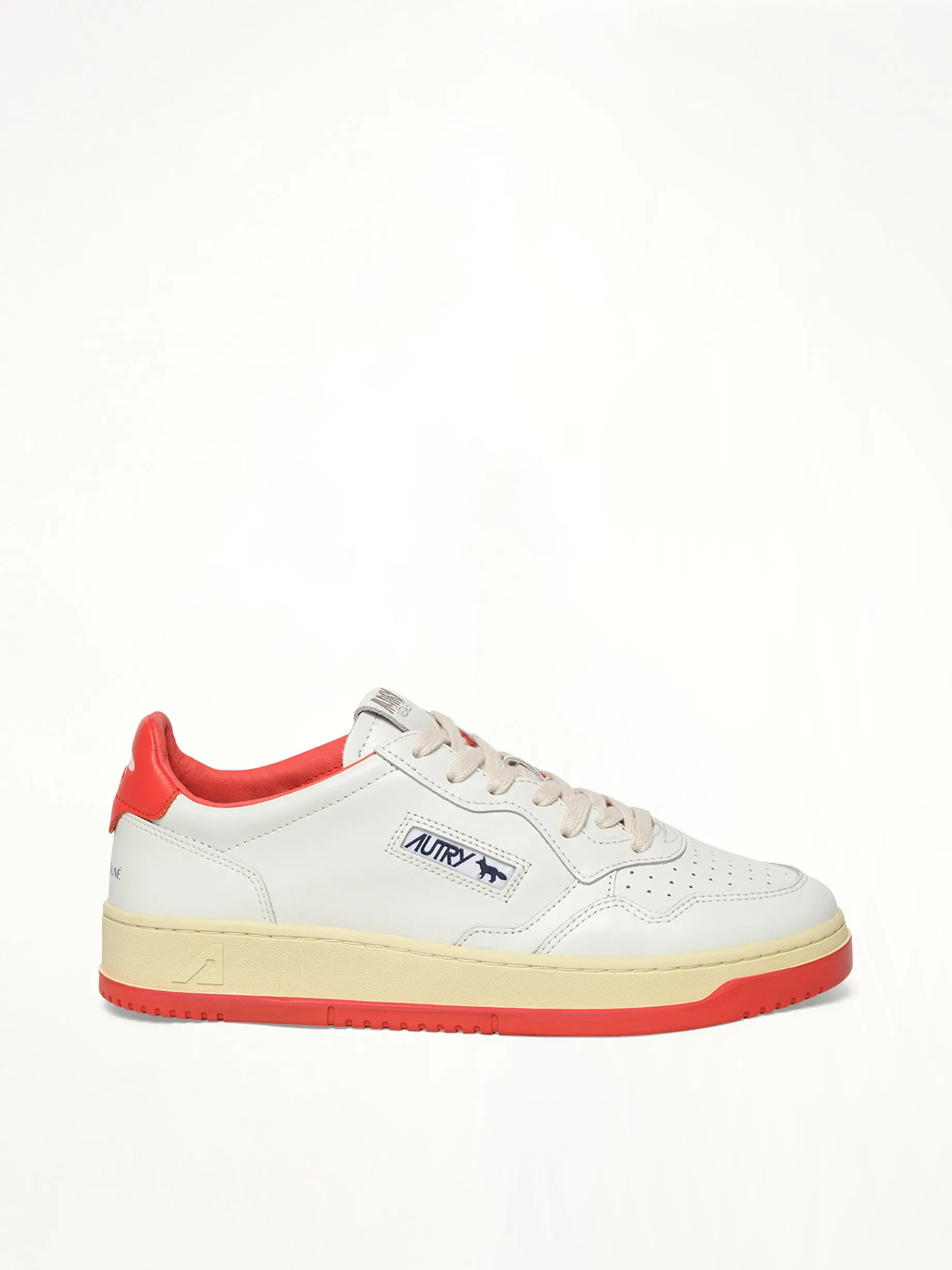 Maison Kitsune Medalist Sneaker in White/Red sold by MARAIS