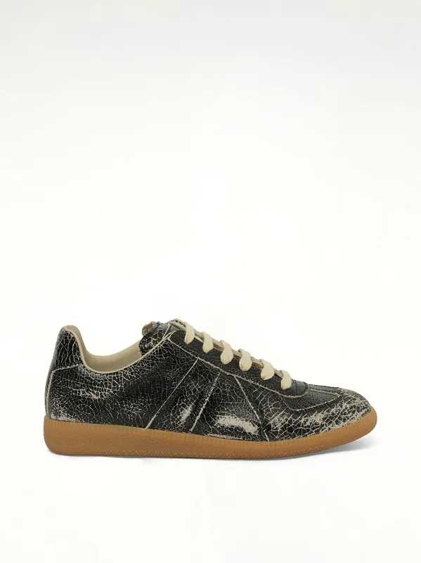 Replica Crackling Leather Sneaker in Black/White sold by MARAIS