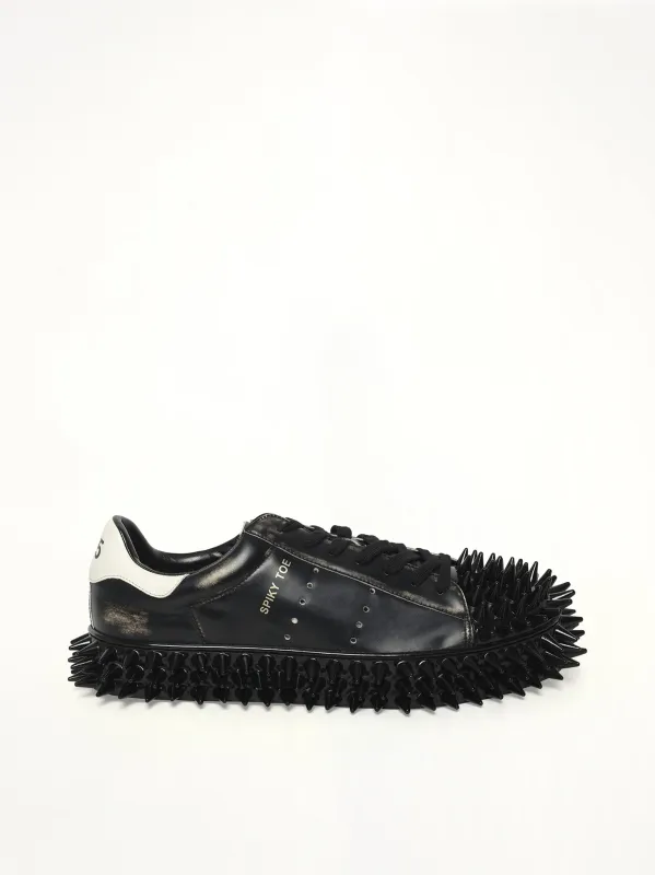 Spiky Leather Sneaker in Black sold by MARAIS