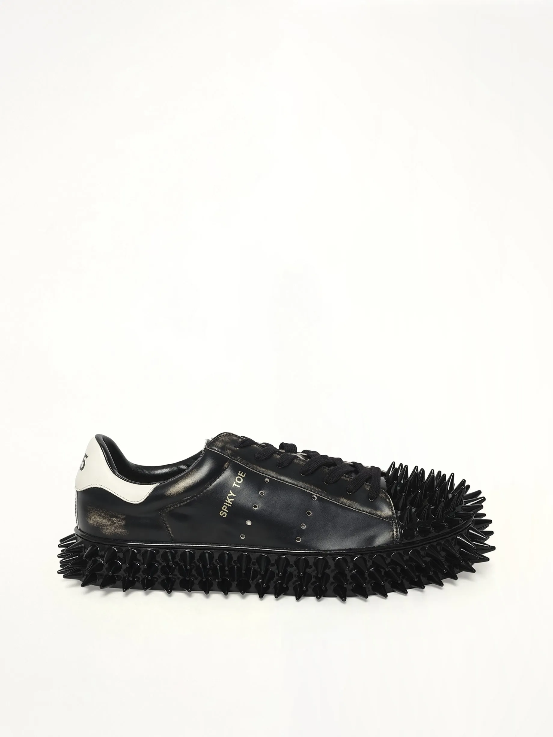 Spiky Leather Sneaker in Black sold by MARAIS