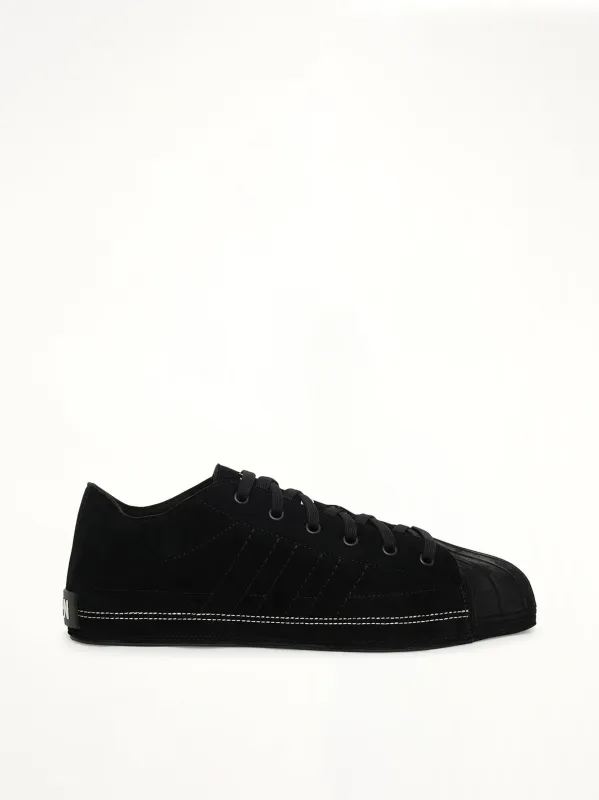 Y-3 X NBHD Nizzastar Lo Sneaker in Black/Off White sold by MARAIS