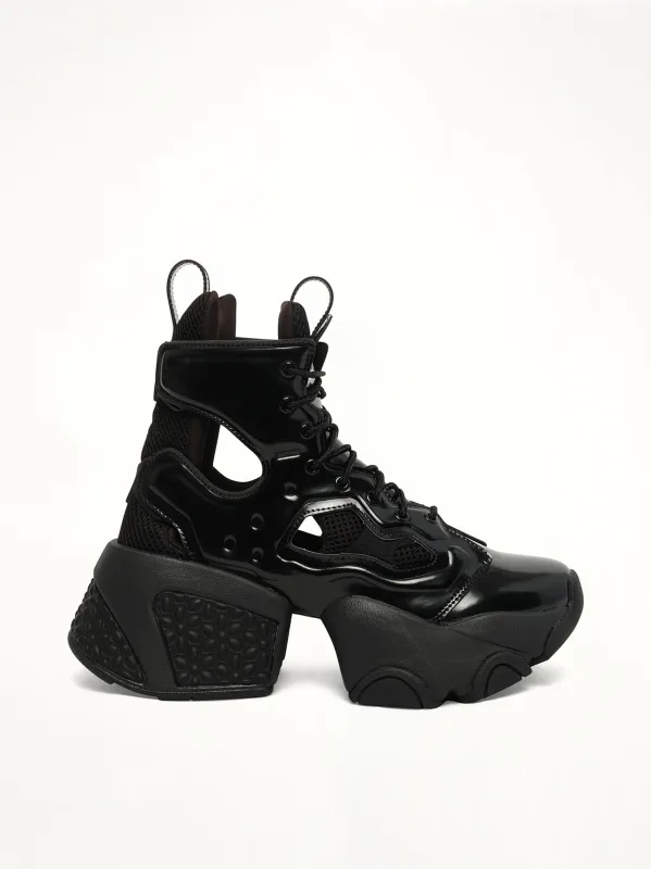 Noir Kei Ninomiya X Reebok High Sneaker in Black sold by MARAIS