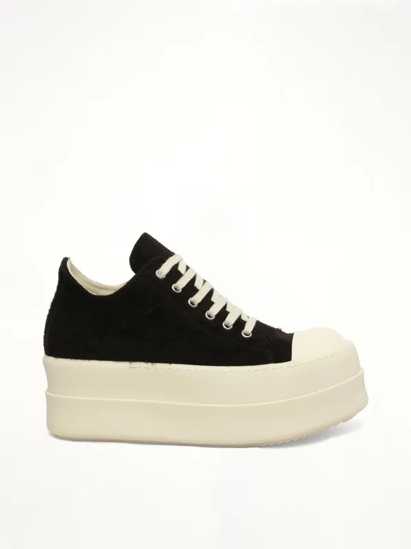 Double Bumper Low Sneaker in Black/Milk/Milk sold by MARAIS
