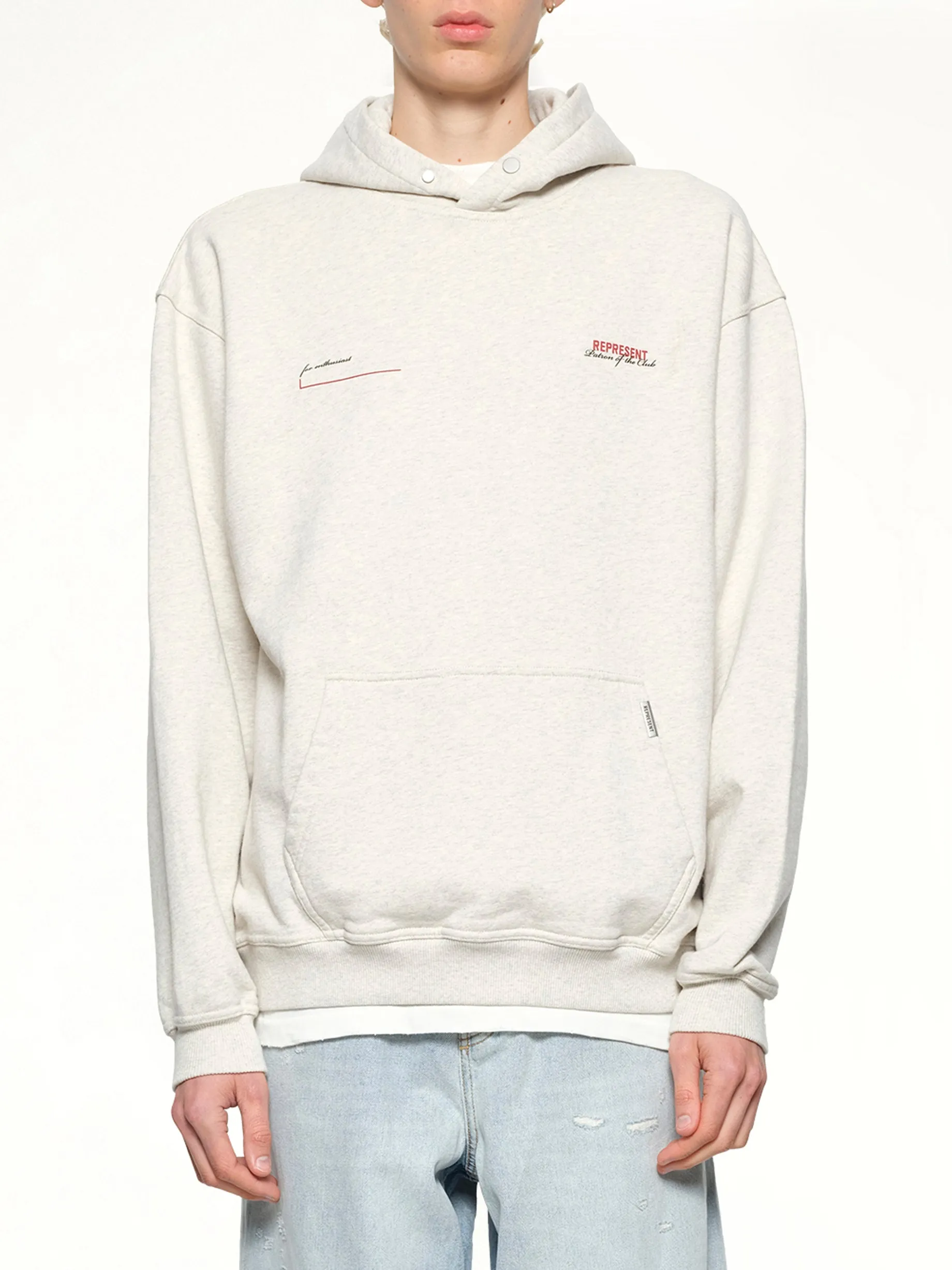 Patron of The Club Hoodie in Cream Marl sold by MARAIS