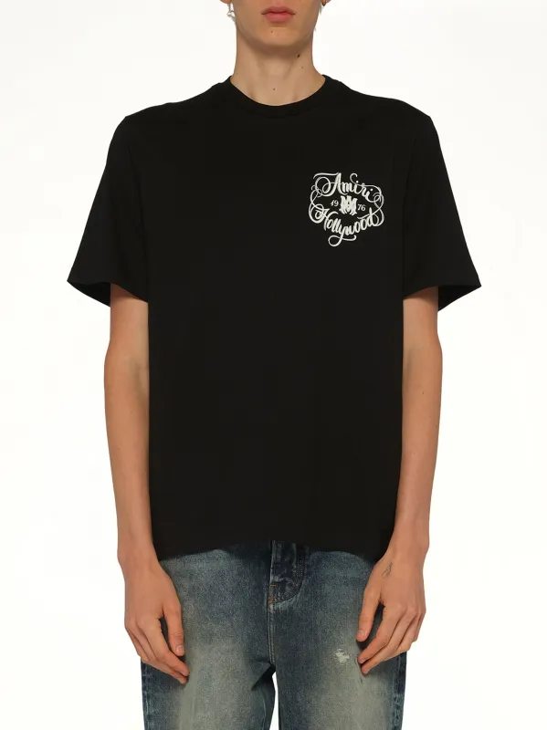 Amiri Hollywood T-Shirt in Black sold by MARAIS