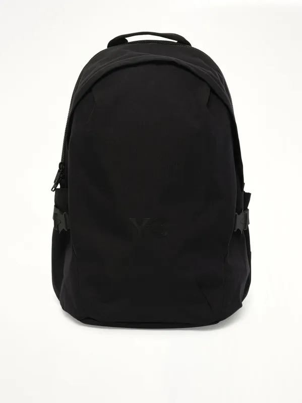 Y-3 Staple Backpack in Black sold by MARAIS