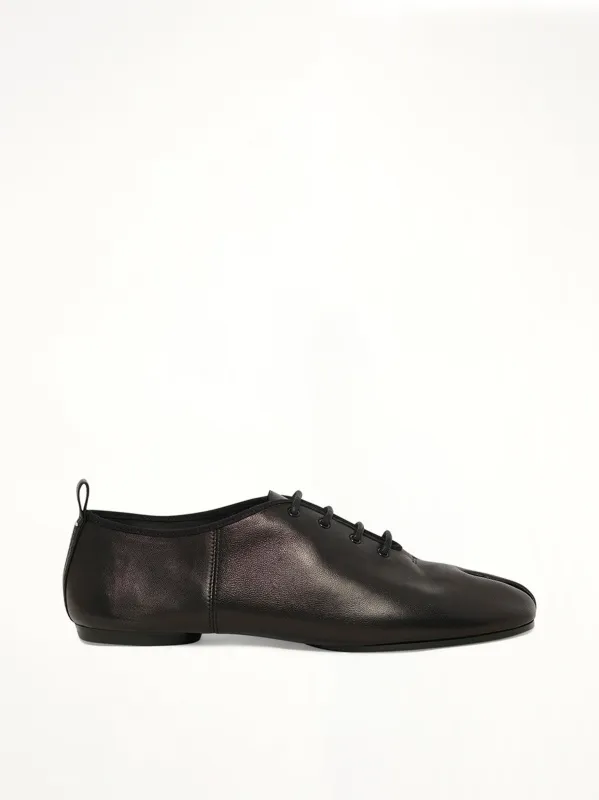Tabi Jazz Lace-up Derby in Black sold by MARAIS