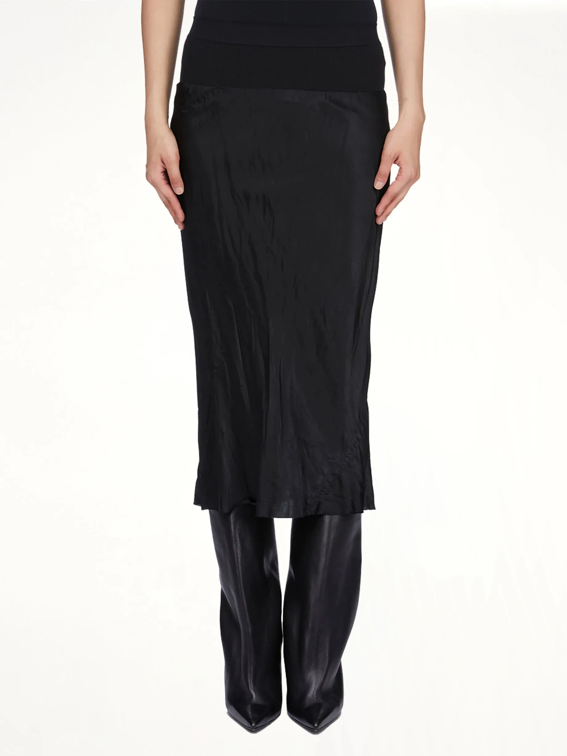 Knee Bias Skirt in Black sold by MARAIS
