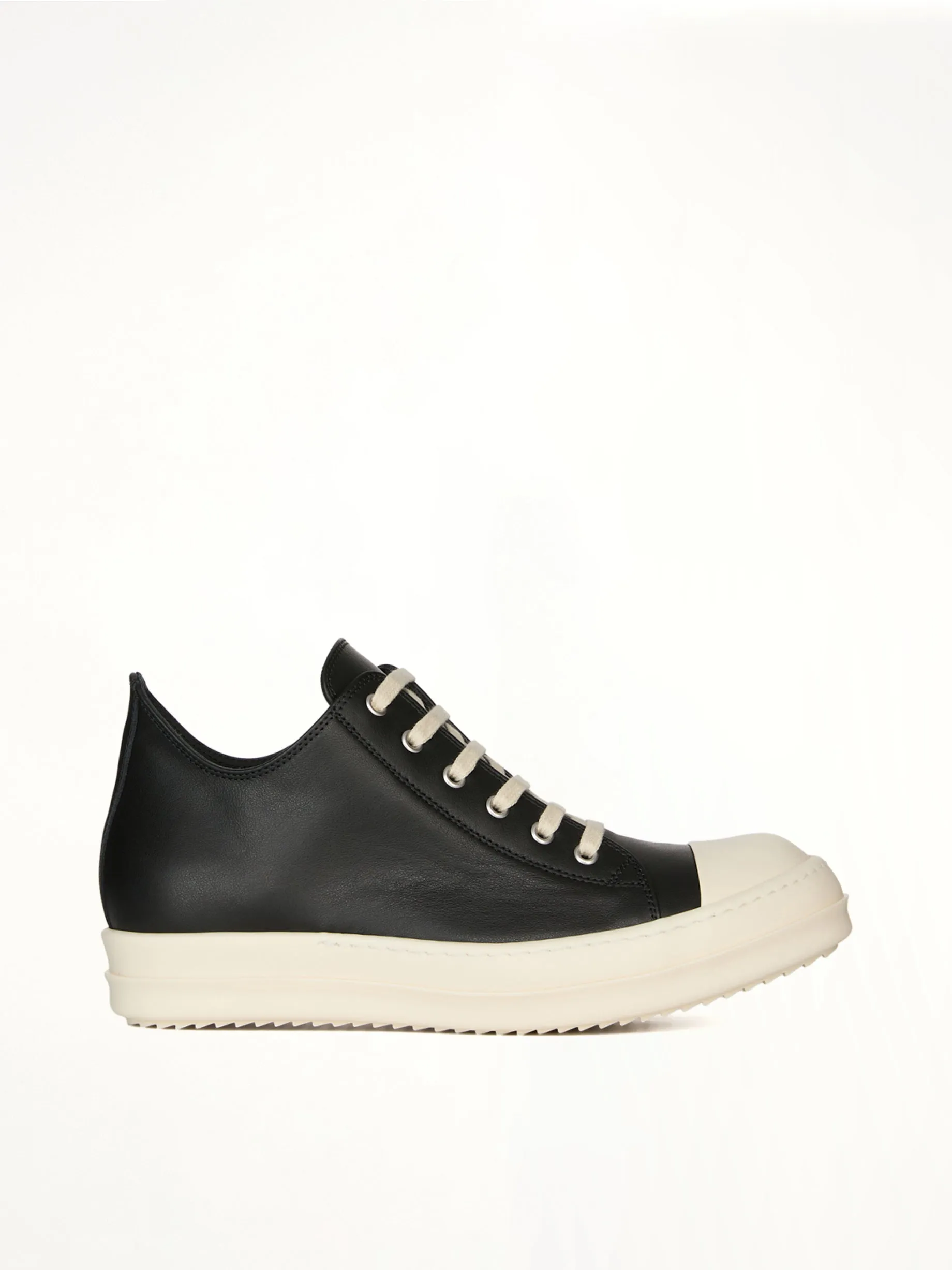 Low Sneaks in Black/Milk sold by MARAIS